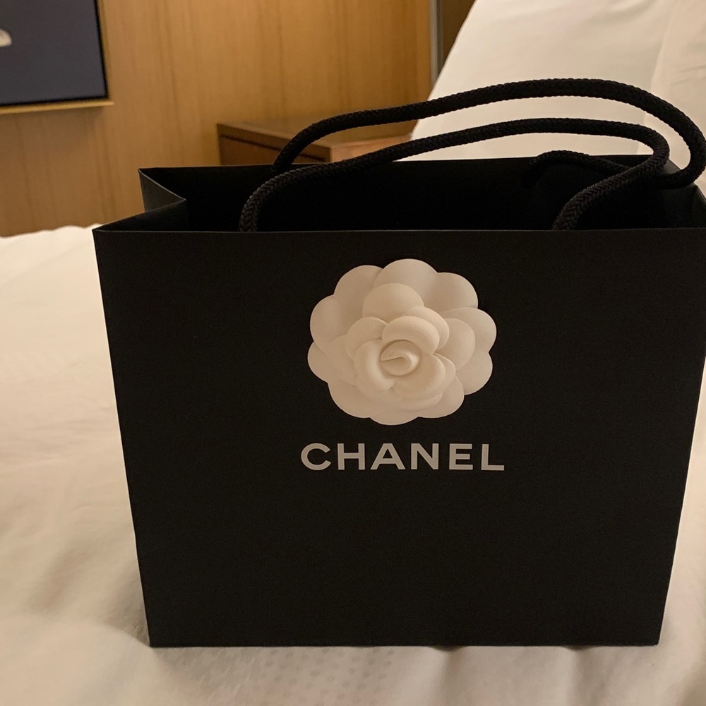 Authentic rare/collectible Chanel paper bag with white camellia ,medium size